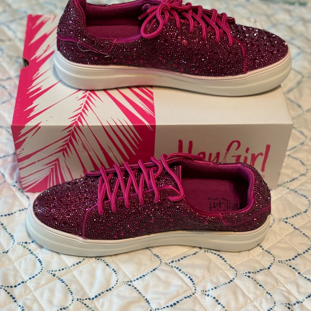 Corky’s fuchsia bedazzled tennis shoe.  Size 9